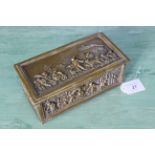 A late 19th Century brass box with rural farming scenes modelled in relief to top and sides