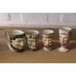Four late 18th Century porcelain Bacchus face mask mugs, one pearl ware,