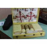 A vintage 1950's Sirram picnic set in a bright yellow case (appears complete)