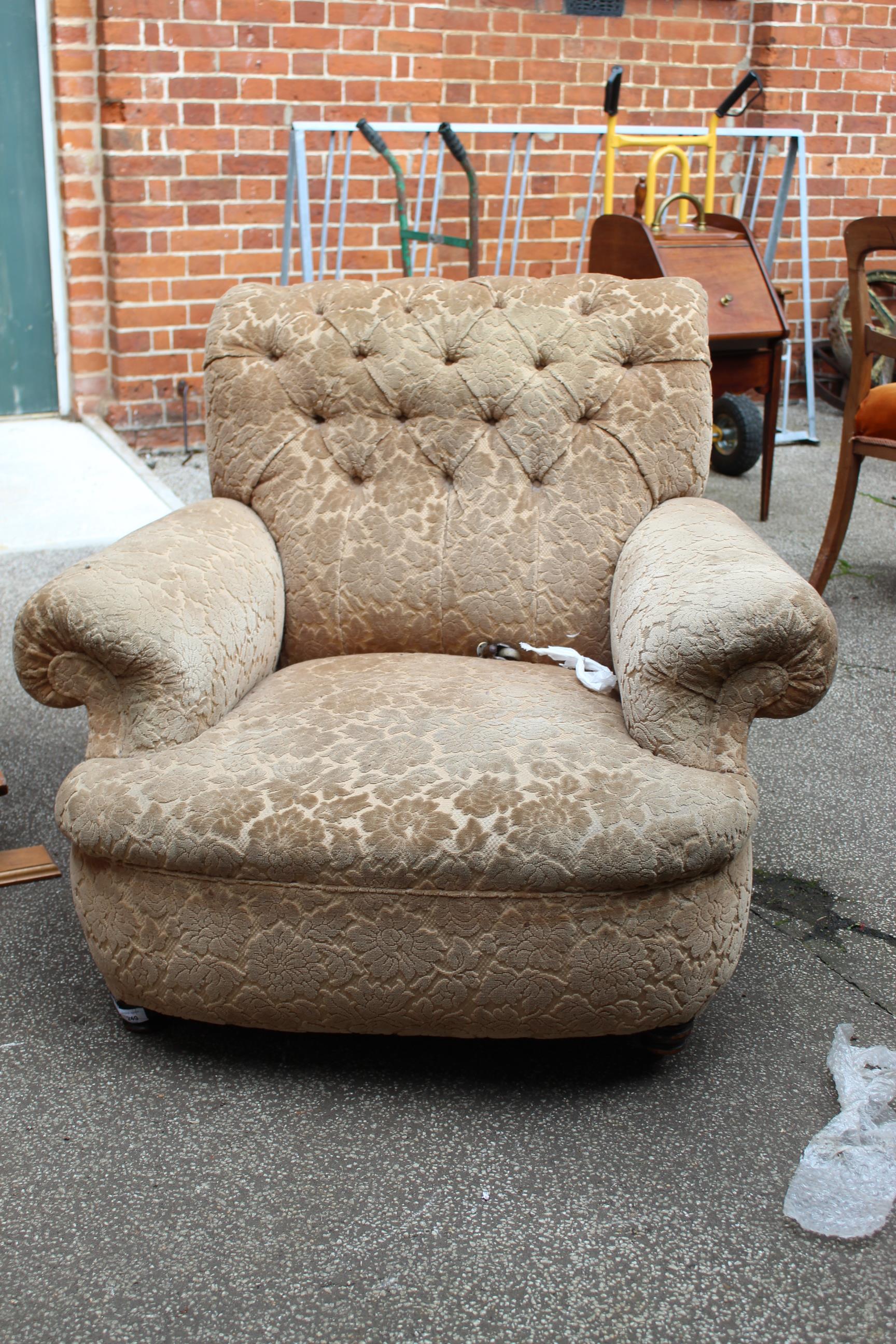 A 1930's upholstered armchair