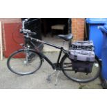 A gent's Kettler City Cruiser bicycle, with panniers,