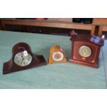 Three wooden cased mantel clocks, including an inlaid example with brass face, chiming with key,