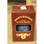 A boxed ceramic decanter of King's Ransom Scotch whisky