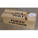 A bottle of Porto Lidador in an unopened wooden box