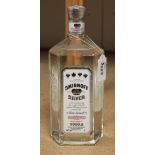 A litre bottle of Smirnoff Silver Label Private Reserve vodka c.