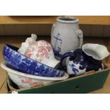 A large stoneware vase with blue sailing ship and elephant handles,