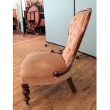 A late Victorian mahogany button back upholstered nursing chair,