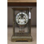 An early 20th Century brass cased crystal regulator mantel clock made by The New Haven Clock