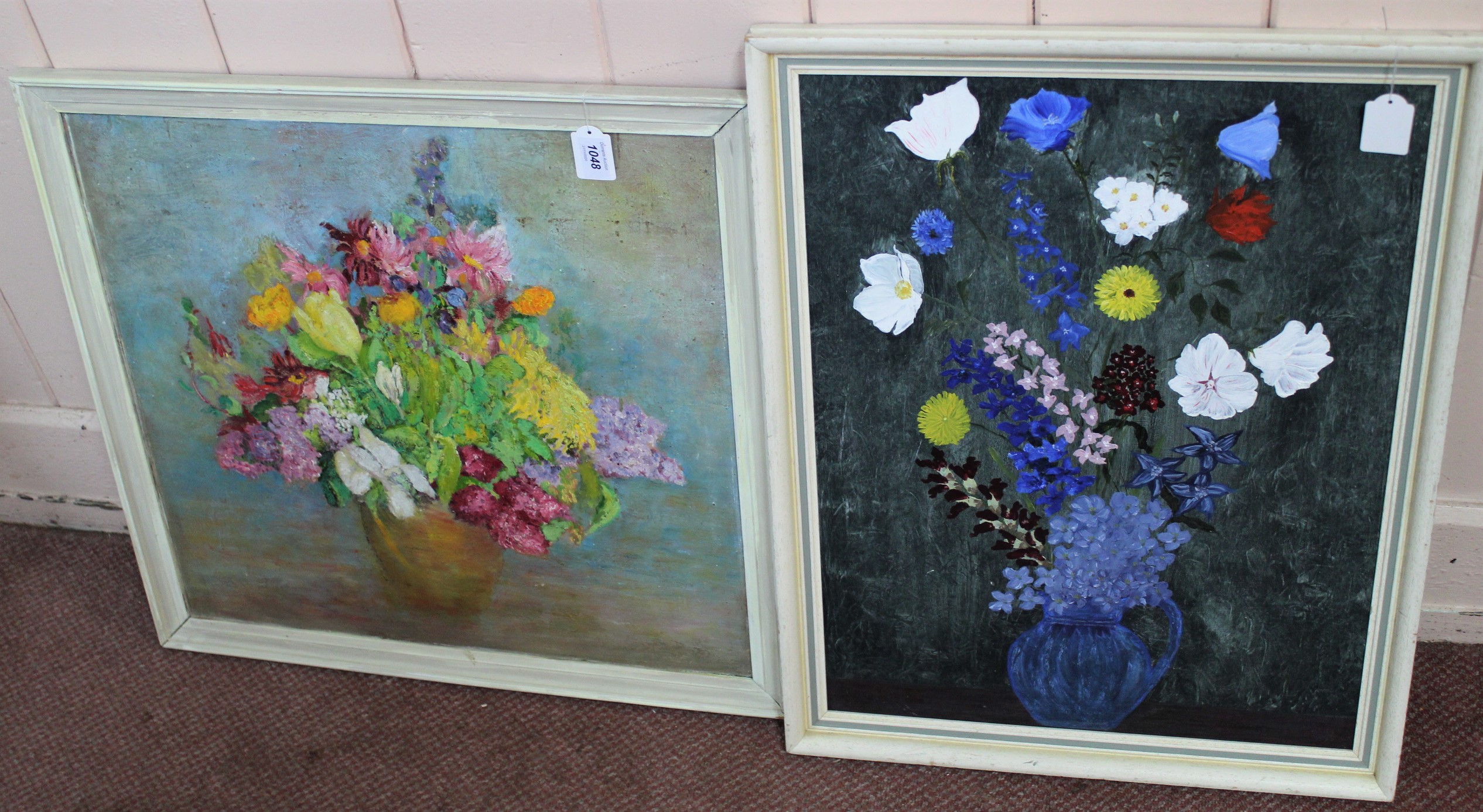 Two framed mid 20th Century oil on board paintings of flowers