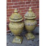A pair of 19th Century painted urns