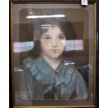 An early 20th Century framed pastel portrait of a boy