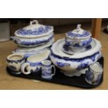Four Victorian blue and white tureens, one with ladle,