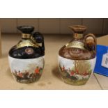 Two Rutherfords 75cl whisky jars with hunting scenes decoration