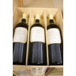 A wooden crate of three 3 litre bottles of Cuvee Millennium Domaine Du Grand Mayne Cote de Duras