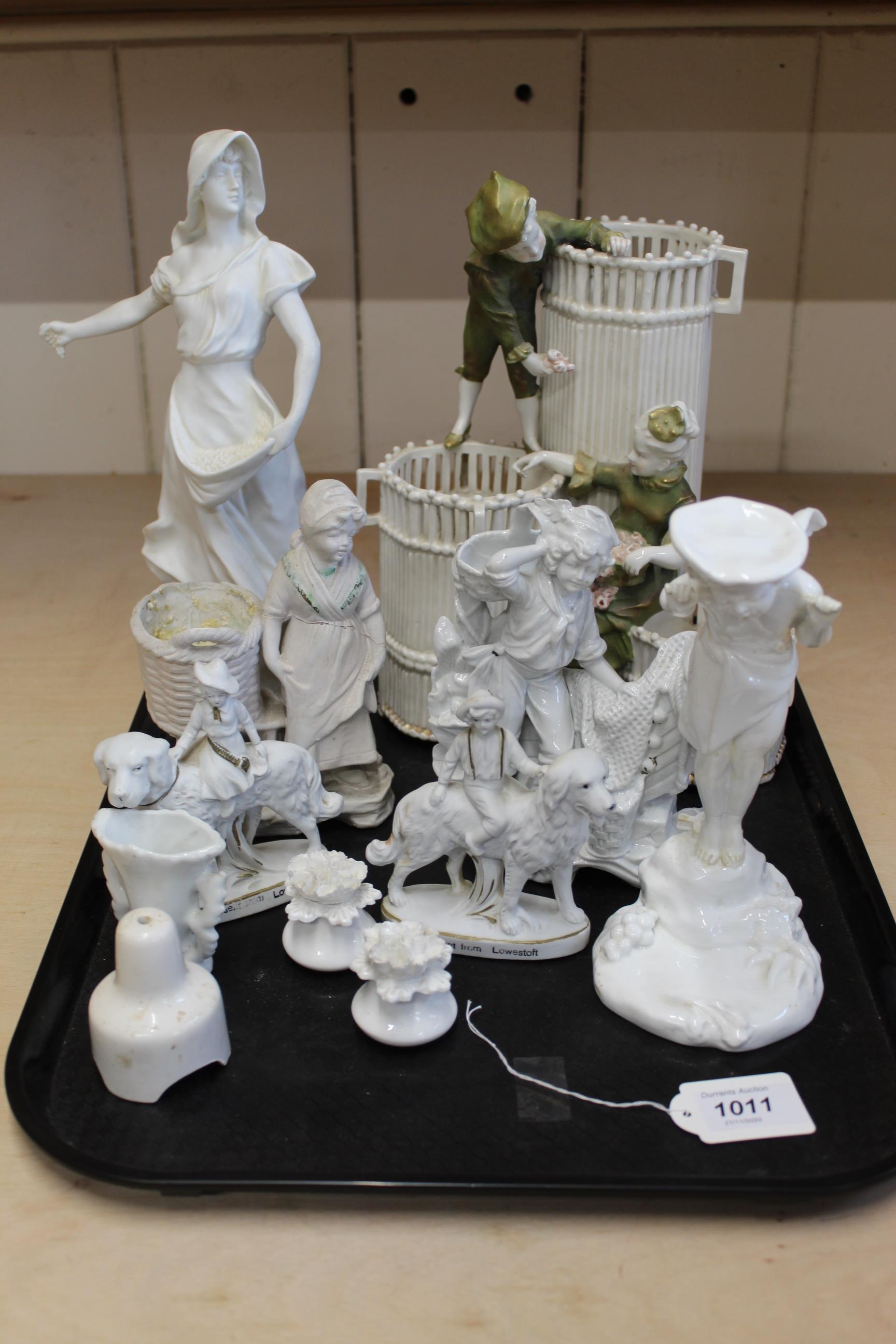 A selection of Parian and white finish figurines including a large Austrian group 11" high,