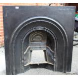 An Edwardian cast iron fire place