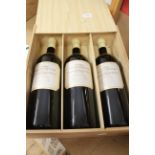 A wooden crate of three 3 litre bottles of Cuvee Millennium Domaine Du Grand Mayne Cote de Duras