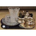 Three piece silver plated tea set, silver finish coaster set and glass plates,