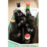 Four bottles of sherry including Copperfields, a bottle of Captain Morgan rum,