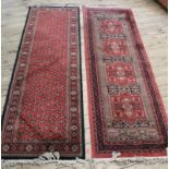 Two dark red ground Persian silk runners 83" x 25 1/2"