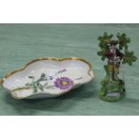 A serving dish painted with an 'Alpine Aster' flower with a shaped gilded border,