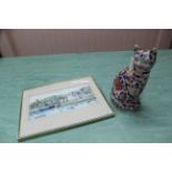 A Chinese porcelain cat in Imari colours, a watercolour of St Peter Port Guernsey,