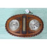 A Victorian oak framed clock barometer,