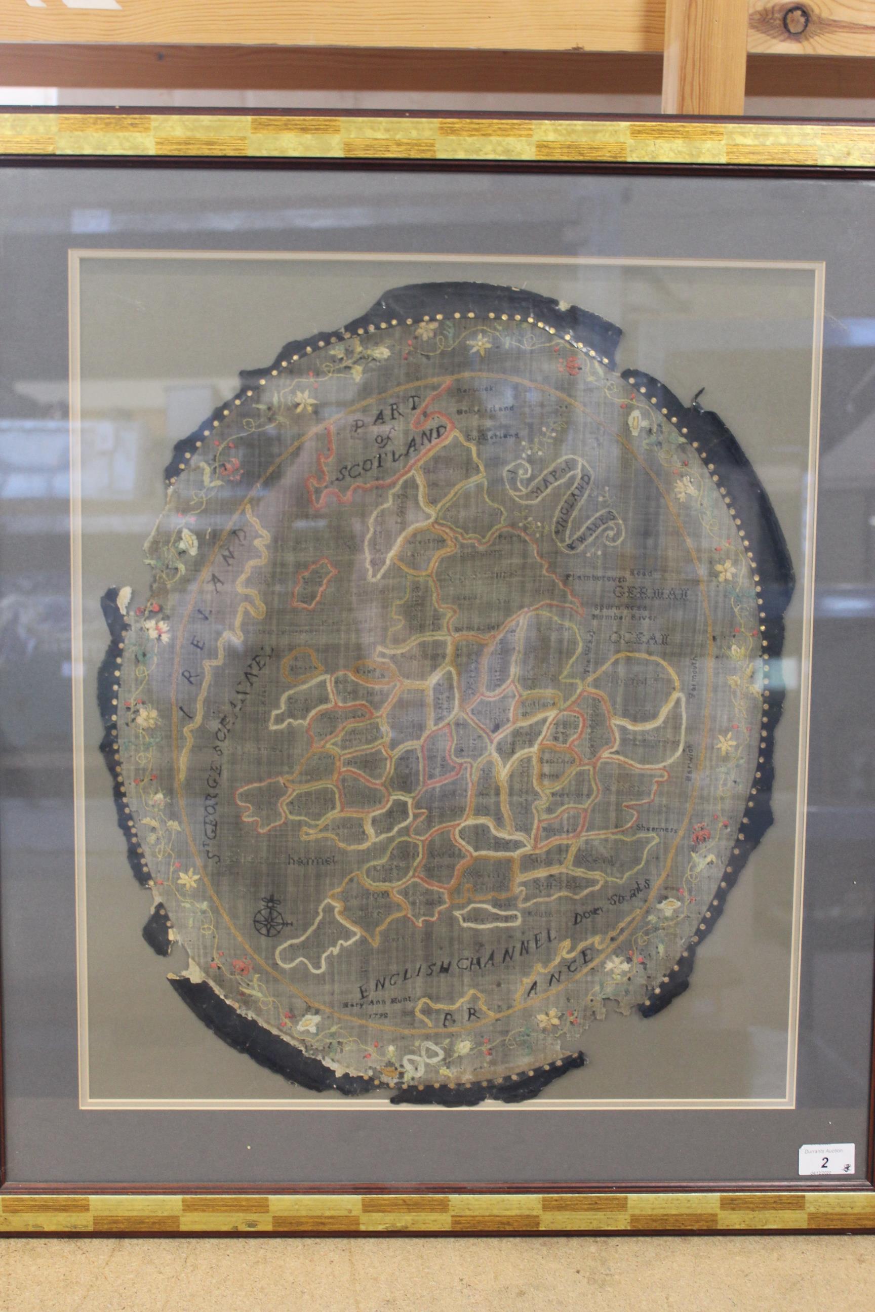 An oval silk map of England and Wales by Mary Ann Hunt 1798, mounted and framed,