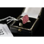 A 9ct gold ruby and diamond set ring, size O, approx 2.