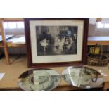 A pair of round wall mirrors with etched decoration and a large framed late 19th Century black and