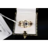 A 9ct gold sapphire white stone floral form ring, size L, approx 2.