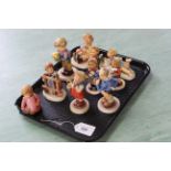 A tray of ten Goebel figures including editions from the Hummel Club