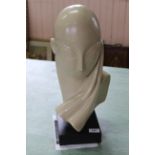 A female form painted plaster bust After Constantin Brancusi 1876-1957, Mademoiselle Pogany,