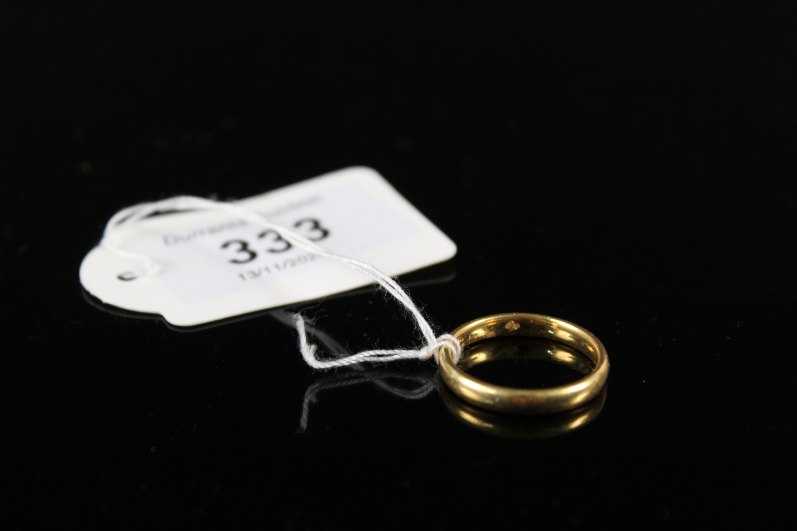 A 22ct gold wedding band, size P, approx 4.