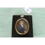 An 18th Century portrait miniature on ivory of a gentleman in an ebony frame,