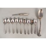 A collection of Georgian silver cutlery including a large spoon,