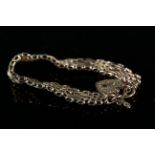 A 9ct gold gate link bracelet with engraved detail and heart shaped padlock clasp,