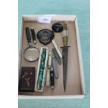 A small tray with Conway Stewart 85L boxed level fill pen, a selection of pen knives,