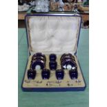 A cased Royal Worcester for Mappin & Webb set of six coffee cups and saucers with a set of six