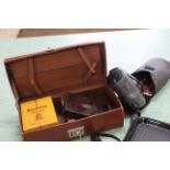 A handy leather case with a boxed Kodak Brownie Reflex camera,