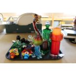 Two Murano glass clowns, a Mdina paperweight, drunken green glass decanter,