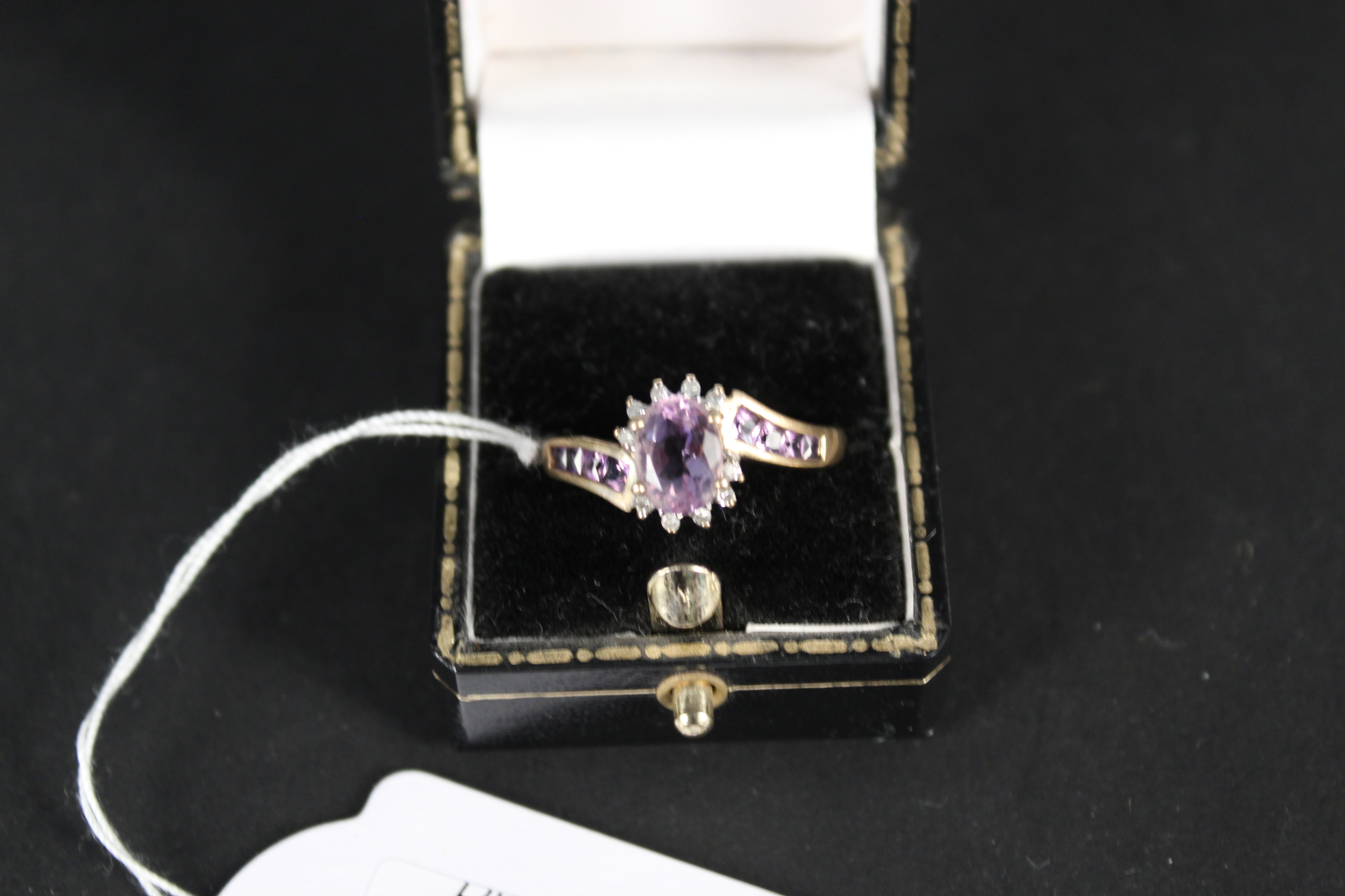 A 9ct gold amethyst and diamond set ring, size S, approx 2. - Image 2 of 2