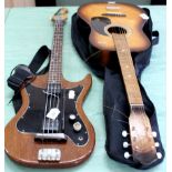 A home built four string electric base guitar plus a Kay acoustic guitar in case