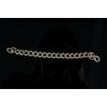 A 9ct gold curb link bracelet (as found),