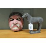 A Chinese black finish clay horse plus a carved hand painted wooden mask