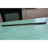 A vintage ash snooker cue bearing plaque 'The Worlds Record 1370, Tom Newman Champion Cue,