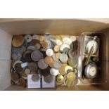 A box containing mixed coins, medallions etc,