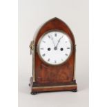 A Regency Lancet mahogany and brass library clock by J Ellicott,