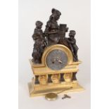 A late 19th Century French gilt brass and bronze mantel clock