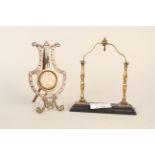 A 19th Century bronze inlaid with glass easel style pocket watch stand,